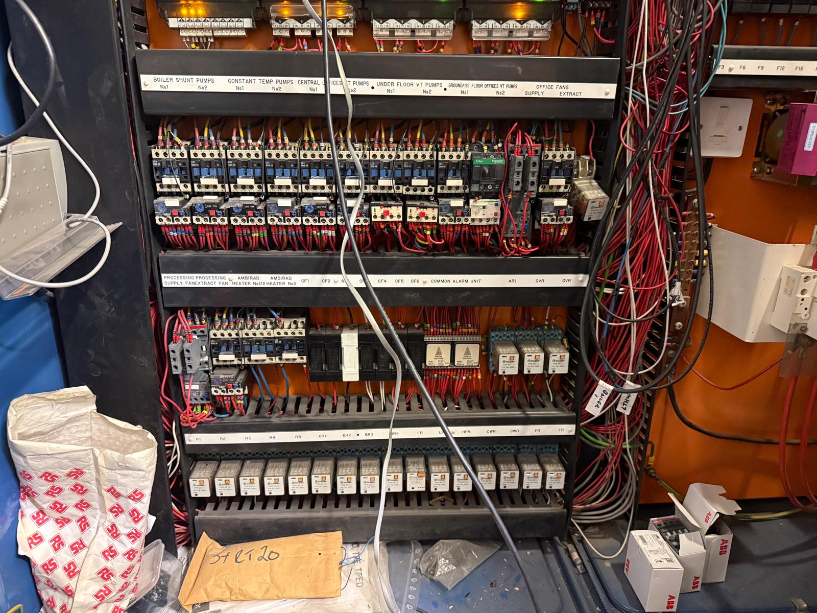 Motor control panel serving boiler shunt and constant-temperature pumps checked on a service visit