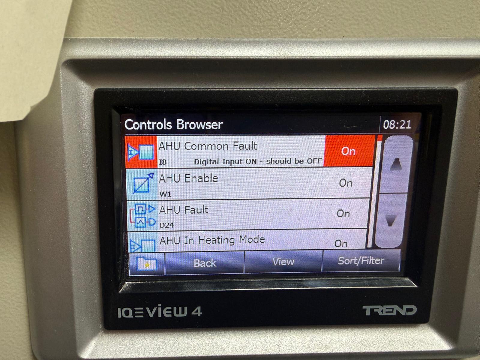 Trend IQView4 HMI showing an active AHU Common Fault alarm attended on a 24/7 BMS call-out