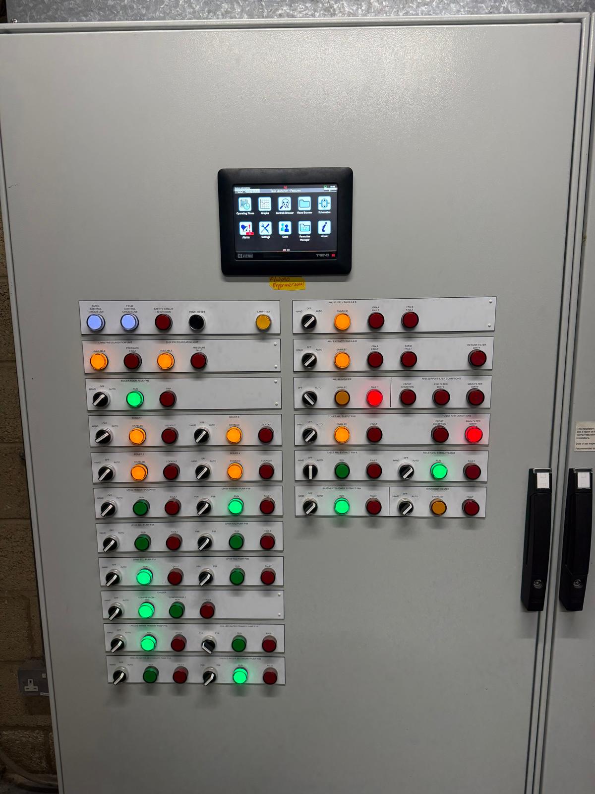 BMS mimic panel with Trend touchscreen HMI and pilot-lamp status indicators at 70 Gray's Inn Road