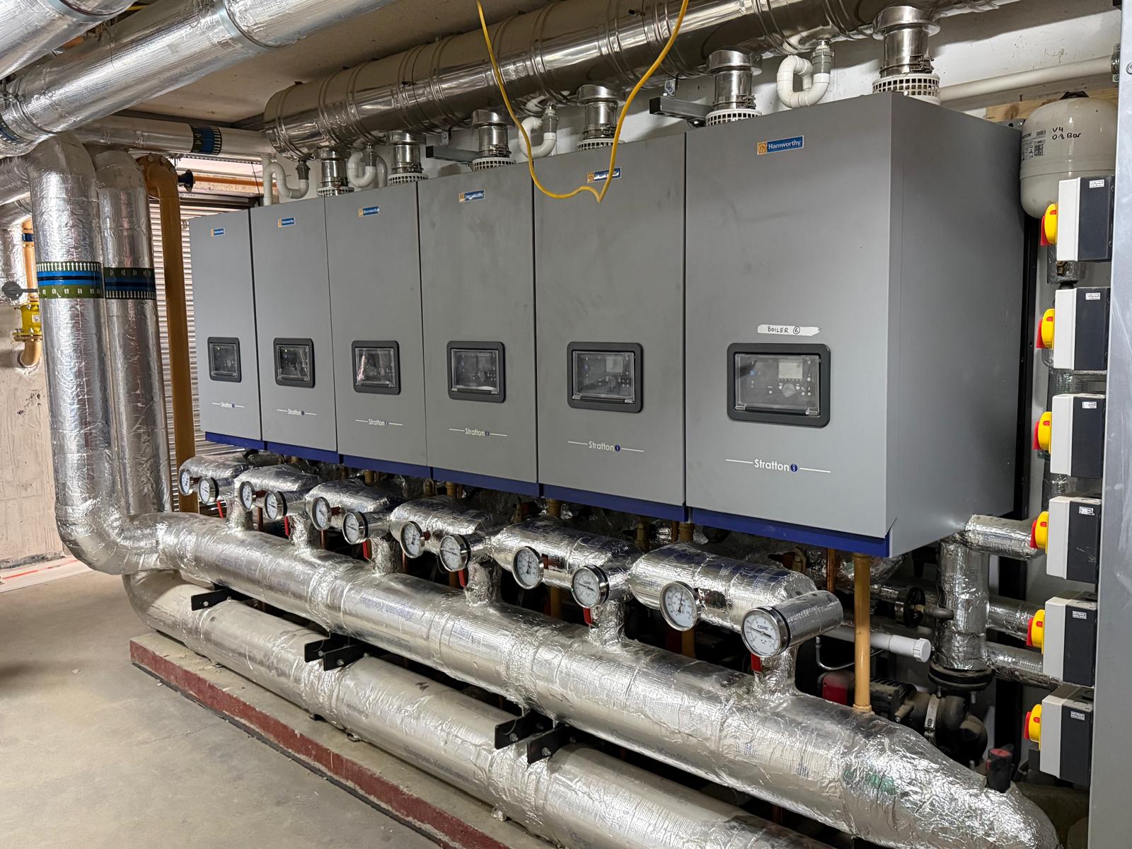Six Hamworthy Stratton condensing boilers on a new LTHW system, all controlled from the BMS by BIAV Controls