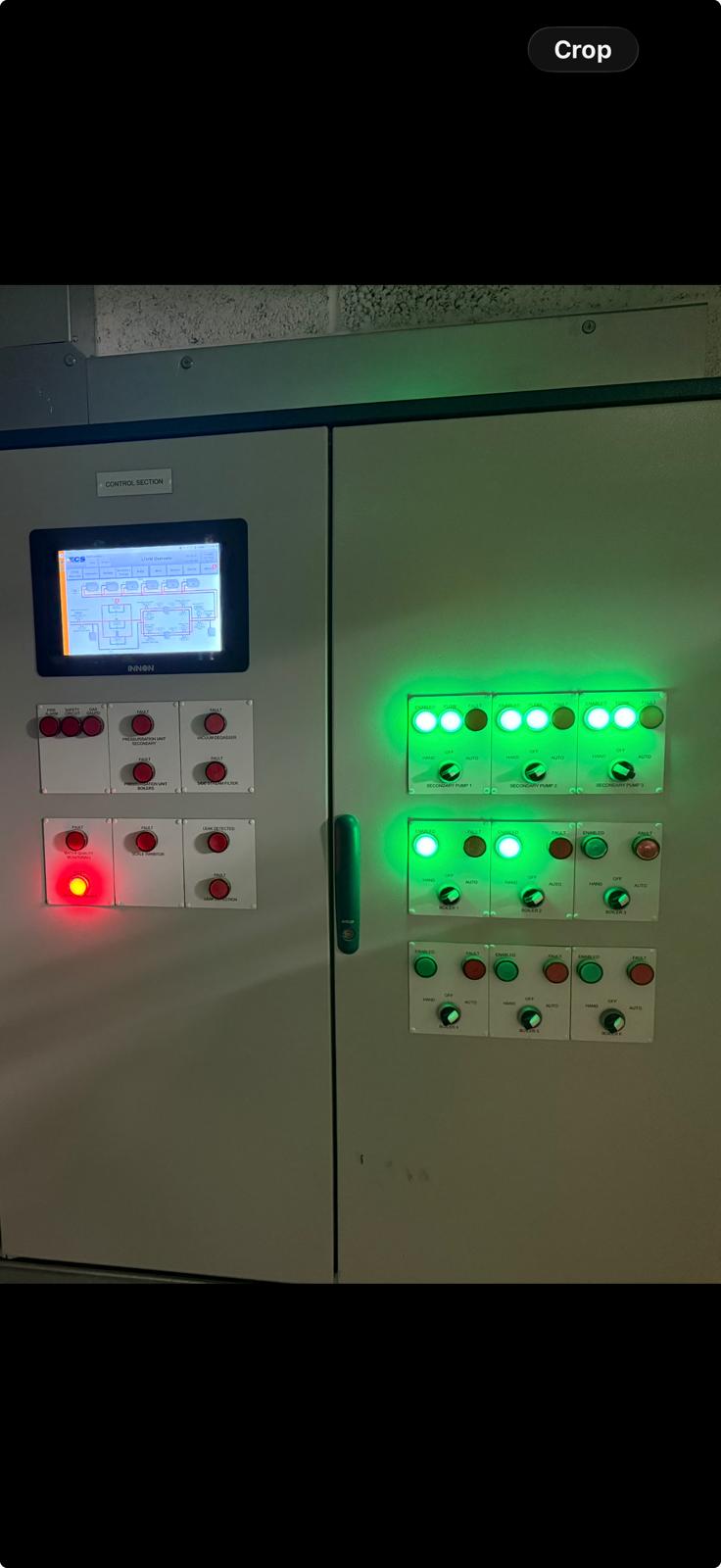 BIAV-designed BMS control panel with INNON HMI, boiler and secondary pump status, built to BS EN 61439